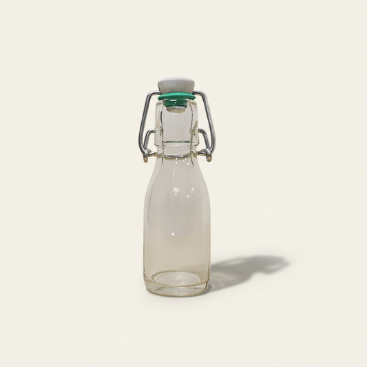 Beugelflesje met porseleinen dop - Glas (100ml)